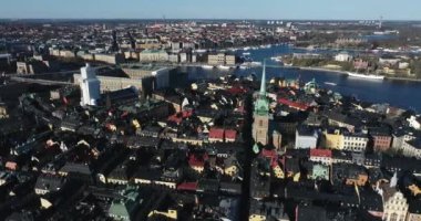 Stockholm Old Town and Royal Palace in Background. It is located in Gamla Stan Island in Stockholm, Sweden. Drone Point of View