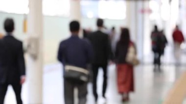 Blurry Metro Train Station Platform in Tokyo. Underground Metro Train Station During Rush Hour. People Leaving Station and Walking on Platform.