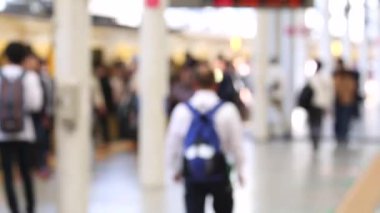 Blurry Metro Train Station Platform in Tokyo. Underground Metro Train Station During Rush Hour. People Leaving Station and Walking on Platform.