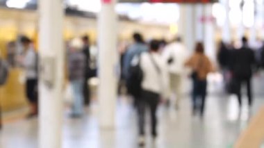 Blurry Metro Train Station Platform in Tokyo. Underground Metro Train Station During Rush Hour. People Leaving Station and Walking on Platform.