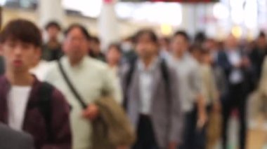 Blurry Metro Train Station Platform in Tokyo. Underground Metro Train Station During Rush Hour. People Leaving Station and Walking on Platform.