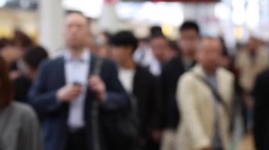 Blurry Metro Train Station Platform in Tokyo. Underground Metro Train Station During Rush Hour. People Leaving Station and Walking on Platform.