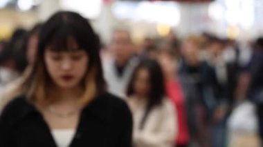 Blurry Metro Train Station Platform in Tokyo. Underground Metro Train Station During Rush Hour. People Leaving Station and Walking on Platform.