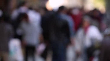 Blurry People in City. Business District. Rush Hour Time People Are Walking on the Sidewalk. Asian People