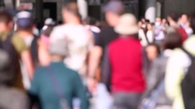 Blurry People in Tokyo City. Business District. Rush Hour Time People Are Walking on the Sidewalk. Japanese People