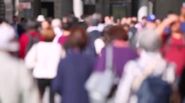 Blurry People in Tokyo City. Business District. Rush Hour Time People Are Walking on the Sidewalk. Japanese People