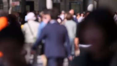 Blurry People in Tokyo City. Business District. Rush Hour Time People Are Walking on the Sidewalk. Japanese People