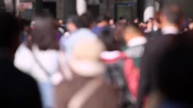 Blurry People in Tokyo City. Business District. Rush Hour Time People Are Walking on the Sidewalk. Japanese People