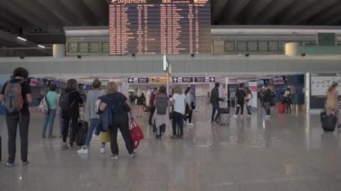 International Fiumicino Airport in Italy, Rome. Interior with People and Passengers