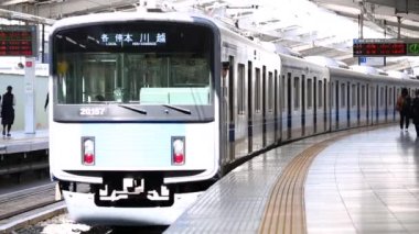 Metro Trains Station Platform in Tokyo. Underground Metro Train During Rush is Ready to Depart. Asian commuters traveling. Train Departure.