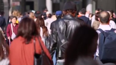 People in Tokyo City. Business District. Rush Hour Time People Are Walking on the Sidewalk. Japanese People. Blurry Background