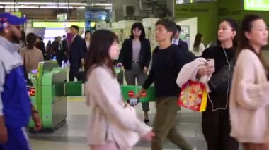 Shinjuku Ticket Gates in Tokyo Metro. Pasmo Card or Suica Card. People Taping Card to go Through the Gate. Tokyo Underground Metro Network