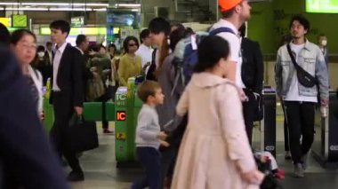 Shinjuku Ticket Gates in Tokyo Metro. Pasmo Card or Suica Card. People Taping Card to go Through the Gate. Tokyo Underground Metro Network