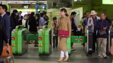 Shinjuku Ticket Gates in Tokyo Metro. Pasmo Card or Suica Card. People Taping Card to go Through the Gate. Tokyo Underground Metro Network
