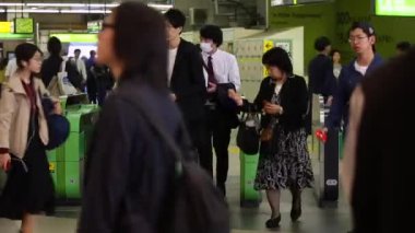 Shinjuku Ticket Gates in Tokyo Metro. Pasmo Card or Suica Card. People Taping Card to go Through the Gate. Tokyo Underground Metro Network