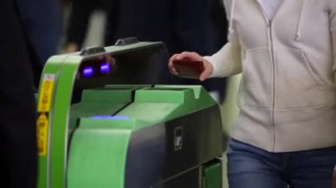 Shinjuku Ticket Gates in Tokyo Metro. Pasmo Card or Suica Card. People Taping Card to go Through the Gate. Tokyo Underground Metro Network