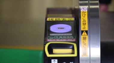 Shinjuku Ticket Gates in Tokyo Metro. Pasmo Card or Suica Card. People Taping Card to go Through the Gate. Tokyo Underground Metro Network