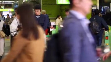 Shinjuku Ticket Gates in Tokyo Metro. Pasmo Card or Suica Card. People Taping Card to go Through the Gate. Tokyo Underground Metro Network