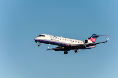NARITA - JAPAN, JANUARY 25, 2017: JA12RJ Bombardier CRJ-702ER Ibex Airlines ANA Connection Landing in International Narita Airport, Japan.