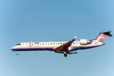 NARITA - JAPAN, JANUARY 25, 2017: JA12RJ Bombardier CRJ-702ER Ibex Airlines ANA Connection Landing in International Narita Airport, Japan.