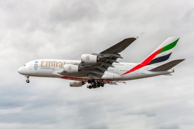 E6-EEX Emirates Airlines Airbus a380 Landing in London Heathrow International Airport. England.