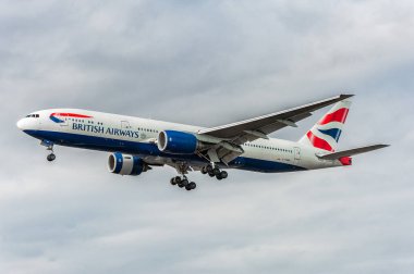 G-YMMI British Airways Boeing 777 Landing in London Heathrow International Airport. England.