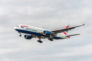 G-YMME British Airways Boeing 777 Landing in London Heathrow International Airport. England.