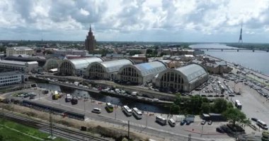 Riga Bus Station in Latvia and Market Square in Background. Drone Point of View.