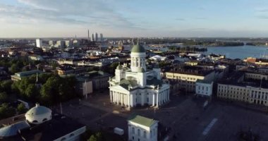 Helsinki Cityscape. Finland. Helsinki Cathedral, Old Town and South Harbor in Background. Sunset Colors. Drone Point of View.