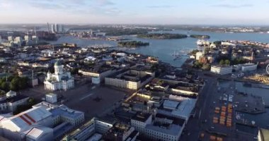 Helsinki Cityscape. Finland. Helsinki Cathedral, Old Town and South Harbor in Background. Sunset Colors. Drone Point of View.