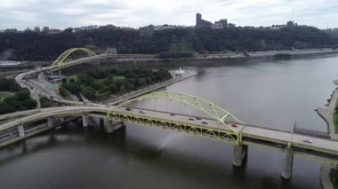 Fort Duquesne Bridge in Pittsburgh, Pennsylvania. Cloudy day, Allegheny river in Background