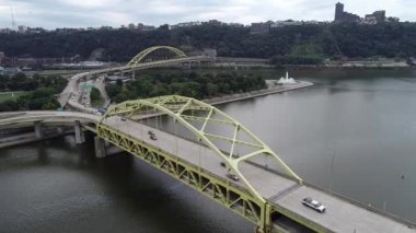 Fort Duquesne Bridge in Pittsburgh, Pennsylvania. Cloudy day, Allegheny river in Background