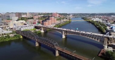 Pittsburgh Cityscape, Pennsylvania. Daytime with Aerial view of business district and traffic in background. Monongahela River and Bridges