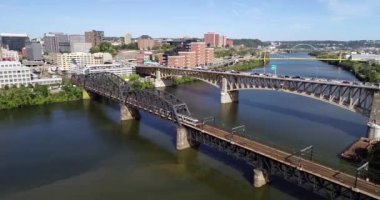 Aerial view of Pittsburgh, Pennsylvania. Daytime and Monongahela river and Subway train on Panhandle bridge in background