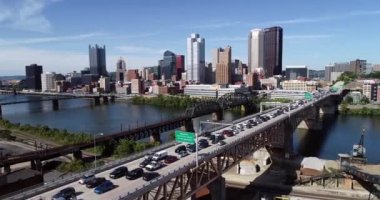 Pittsburgh Cityscape, Pennsylvania. Daytime with Aerial view of business district and traffic in background. Monongahela River.