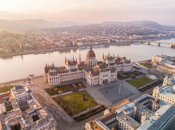 Aerial Shot of the Hungarian Parliament Building and the Danube River in Budapest Cityscape Captured from a Drone Point of View