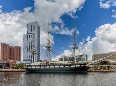 Baltimore, Maryland - October 03, 2019: View of Inner Harbor and Downtown Skyline Aerial in Baltimore, MD. Ship in Foreground