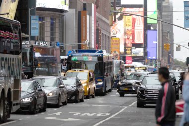 Manhattan, NYC - October 06, 2019: Traffic in Manhattan, NYC. Public Transport, Taxi and Vehicles in Background