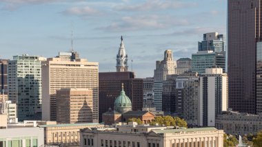 Philadelphia City Center and Business District Skyscrapers. Cloudy Blue Sky, Beautiful Sunlight. City Hall Statue in Background