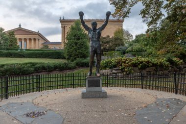 PHILADELPHIA, PENNSYLVANIA - SEPTEMBER 30, 2019: The Rocky Statue in Philadelphia, USA. Massive, landmark statue of fictional boxer Rocky Balboa. Originally created for the movie Rocky III