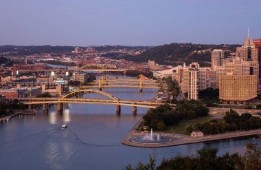 Cityscape of Pittsburgh and Evening Light. Fort Duquesne Bridge in Background.