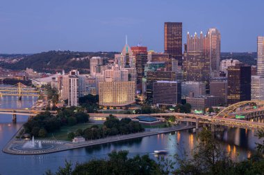 Cityscape of Pittsburgh and Evening Light. Fort Pitt Bridge in the Background. Beautiful Pittsburgh Skyline