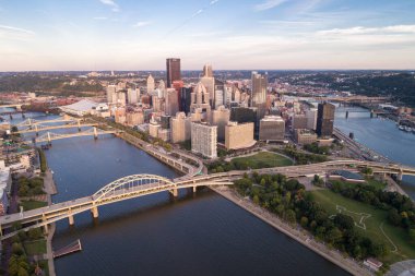 Aerial view of Pittsburgh, Pennsylvania. Business district and river in background. Three Bridges in Background