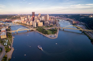 Aerial view of Pittsburgh, Pennsylvania. Business district Point State Park Allegheny Monongahela Ohio rivers in background. Cityscape. Sunset