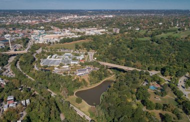 Schenley Park and Phipps Conservatory Botanical Gardens in Pittsburgh, Pennsylvania. Schenley Park's horticulture hub features botanical gardens and a steel glass Victorian greenhouse