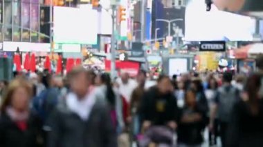 Fast View of Anonymous Urban Crowd of commuters, unrecognizable tourists  walking in Manhattan, NYC. 5th Aveue. Blurry Background. Daytime