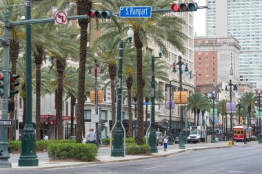Cityscape of New Orleans with Tram And People. Street Life.