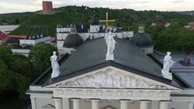 Roof of Cathedral in Vilnius Old Town in Lithuania. Gediminas Castle, Cathedral and Bell Tower in Background. Hill of Three Crosses.