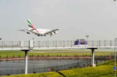 Emirates Airlines Airbus A380 A6-EDU landing in London Heathrow International Airport.