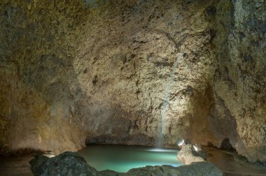 Inside the Harrison's Cave in Barbados. Rocks and Water. Extremely Long Exposure.